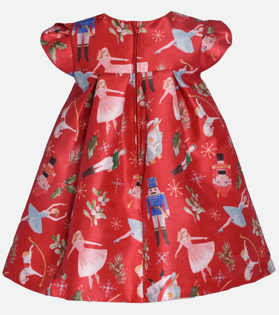 Matching sister christmas dress for baby girl in red with nutcracker print