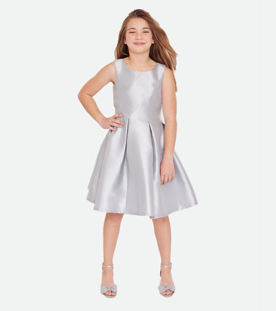 Tween Girls Party Dress Silver with asymmetrical piecing and exaggerated pleats.
